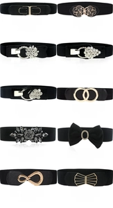 Detail of diverse black elastic waist belts for women with decorative metal buckles