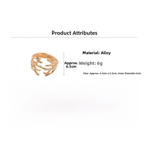Detailed view of gold branch cuff bracelet showing alloy texture and dimensions