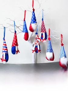 Set of 7 Fourth of July faceless gnomes with patriotic stars and stripes hanging on a white branch