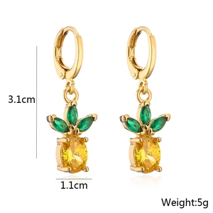 Detail shot of pineapple earrings with green and yellow zircons measuring 3.1cm by 1.1cm