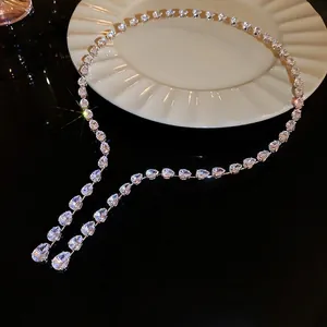 Elegant adjustable silver choker featuring pear-shaped cubic zirconia on black mirror surface