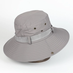 Detail of grey waterproof sun hat showing breathable metal vents and reinforced stitching