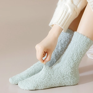 Soft mint green coral fleece crew socks with cable knit texture for winter warmth