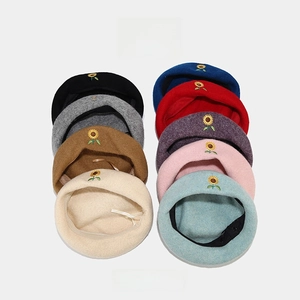 Classic wool beret for women featuring colorful sunflower embroidery in nine assorted colors