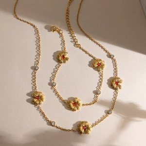 Conjunto de collar y pulsera de margarita en acero inoxidable chapado en oro 18K