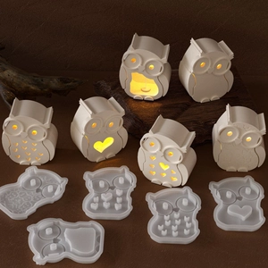 DIY Halloween owl resin silicone molds with warm LED light effects on wood background