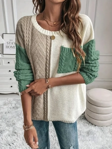 Women's cable knit sweater in cream, beige, and green colorblock with pocket detail