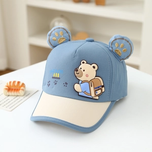 Detail of blue cartoon bear baseball cap with 3D ears and adjustable velcro strap