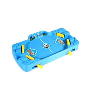 Kids tabletop soccer ejection game board with blue plastic arena and yellow controls