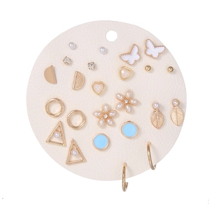 Set of 9 pairs gold metal stud earrings with pearls, crystals, and butterfly designs