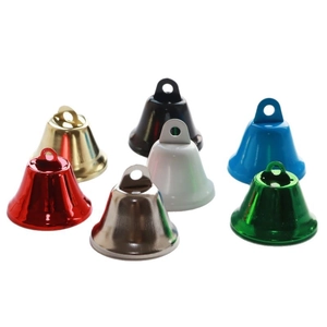 Set of seven colorful 38mm metal bells in assorted vibrant colors on white background