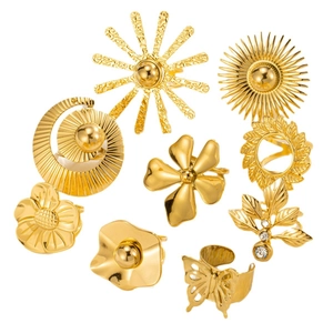 Set of nine bohemian gold rings with sunflower butterfly and geometric patterns