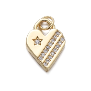Golden heart pendant with zircon star motif and jumping ring on white background