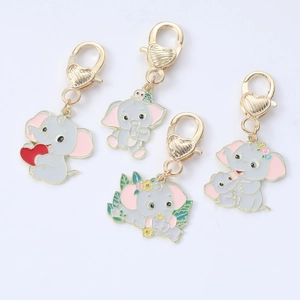 Cute enamel elephant keychain set with gold lobster clasps and heart accents on white base