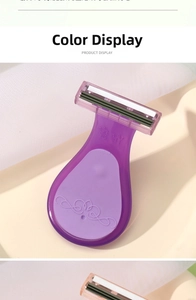 Detailed close-up of portable purple women's razor featuring triple-blade design and wave handle