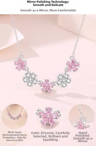 Detail view of S925 silver necklace featuring five pink and white zirconia cherry blossoms