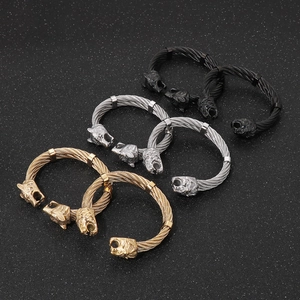 Punk style wolf head cable bangles for men in gold, silver, and black finish