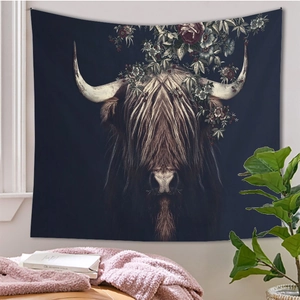 Artistic Highland cow tapestry with vintage floral crown hanging in a cozy bedroom