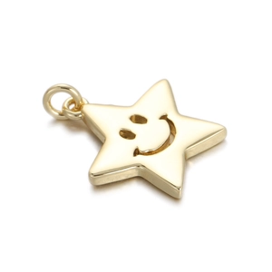 Macro shot of 18K gold plated star pendant featuring a carved smiley face detail