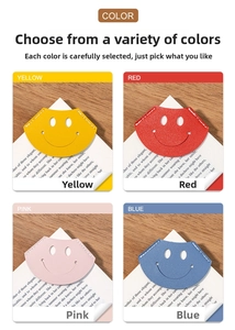 Detail of leather smiley face corner bookmarks in yellow, red, pink, and blue with stitching
