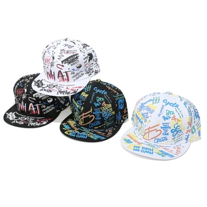 Detail view of four graffiti snapback hats with bold street culture typography print