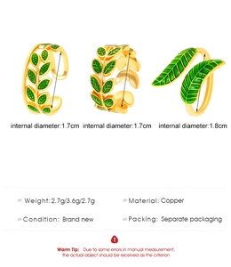 Detailed view of copper green enamel leaf rings showing diameter and weight specifications
