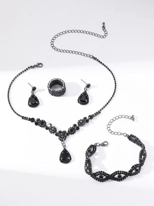 Elegante set di gioielli a quattro pezzi con pietre nere, collana, orecchini e anello