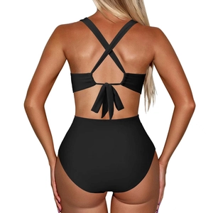 Black high-waisted bikini with criss-cross halter straps and back bow knot detail