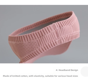 Detailed macro view of the pink knitted cotton sun hat showing its elastic texture