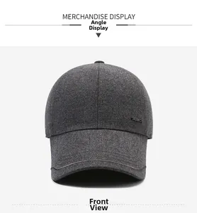 Close-up of thick dark grey wool baseball cap showing premium texture and metal buckle detail