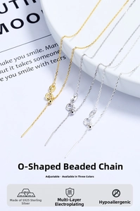 Close-up of adjustable s925 silver cross chain necklaces in gold and silver finishes
