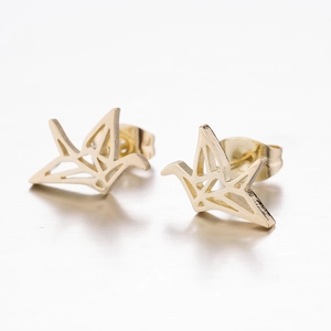 Macro shot of gold paper crane earrings with minimalist geometric origami design