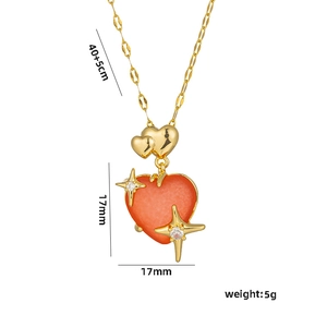 Gold chain necklace featuring an orange heart pendant and small star charms on white background