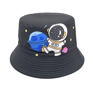 Close-up of black kids sun hat with cartoon astronaut and blue planet patterns