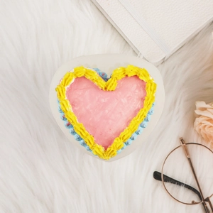 Heart-shaped silicone cake mold for DIY candles and aromatherapy with vibrant colorful accents
