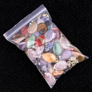 Natural teardrop crystal pendants in assorted colors with silver metal clasp hooks