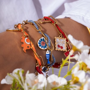 Colorful multi-layer hand-woven rope bracelet with gold animal and flower pendants