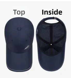 Detail of navy sport cap showing breathable mesh interior and embroidered mountain logo