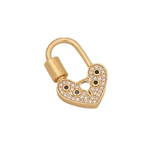 Gold heart lock pendant with pavé crystals and black gems on a clean white background
