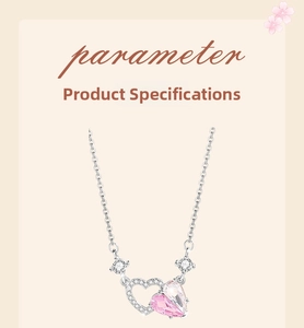 Macro view of double heart necklace with pink crystal and small white diamonds