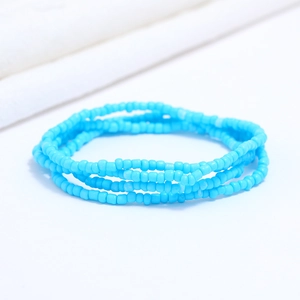 Macro shot of colorful multilayer blue seed bead waist chain for beach and summer