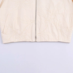 Women's chic beige floral embroidered jacket featuring a metal zipper and side pockets
