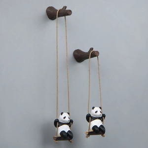 Creative panda hanging ornament featuring a cute resin panda swinging on a branch rope