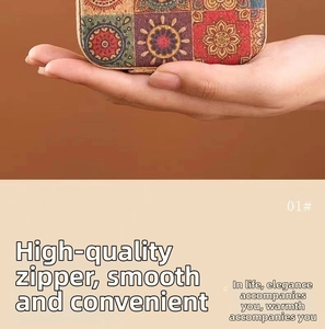Detail view of cork jewelry pouch with colorful mandala pattern and smooth zipper closure