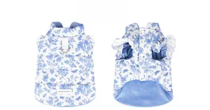 Detail view of floral pet vest with metal D-ring and soft fleece lining for warmth