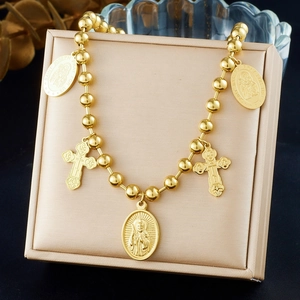 Gold Saint Joseph oval pendant necklace with cross charms on bead chain in a gift box