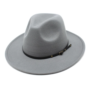 Close-up of light grey fedora hat with black faux leather band and gold metal buckle