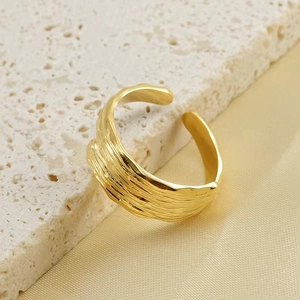Minimalist gold-plated stainless steel open ring with unique irregular textured design