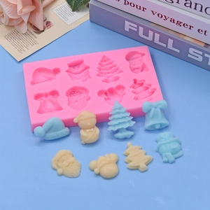 Christmas silicone mold featuring 8 festive patterns like Santa Claus and trees for DIY baking