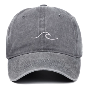 Faded grey washed cotton baseball cap with white embroidered waves on front view